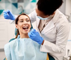 Woman smiling during dental checkup