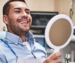 Man with tooth sensitivity